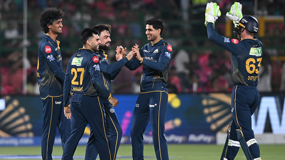 Gujarat Titans' Rashid Khan celebrates with teammates the wicket of Rajasthan Royals' Donovan Ferreira during the Indian Premier League cricket match between Rajasthan Royals and Gujarat Titans in Jaipur, India, Saturday, May 9, 2026. - | Photo: AP/STR