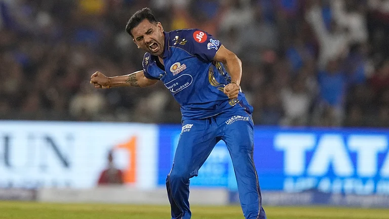 Mumbai Indians' Deepak Chahar got the priced wickets of Virat Kohli and Devdutt Paddikal to put RCB on the backfoot in the chase in Raipur on Sunday, May 10. - AP Photo/Mahesh Kumar A.