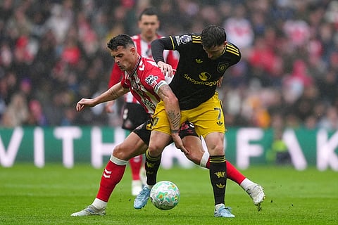 Sunderland's Granit Xhaka, left, and Manchester United's Mason Mount in action during the English Premier League soccer match between Sunderland and Manchester United in Sunderland, England.
