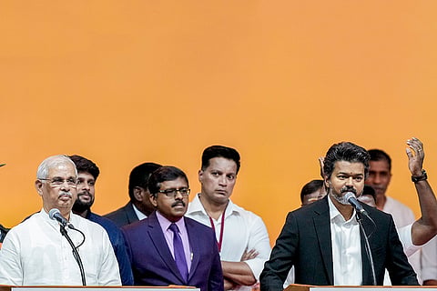 Tamil Nadu Governor Rajendra Arlekar administers the oath to state chief minister-elect and Tamilaga Vettri Kazhagam (TVK) chief C Joseph Vijay during the latter’s swearing-in ceremony, at Jawaharlal Nehru Stadium, in Chennai.