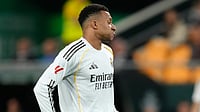 Will Kylian Mbappe Play In Barcelona Vs Real Madrid, La Liga 2025-26 El Clasico? AP Photo : Real Madrid's Kylian Mbappe reacts during a La Liga soccer match between Real Betis and Real Madrid in Seville, Spain.