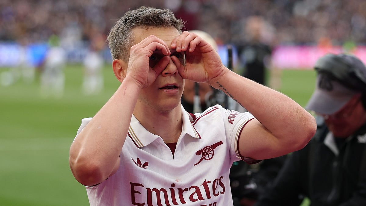 Arsenal's Leandro Trossard celebrates after scoring during the Premier League soccer match between West Ham and Arsenal in London. - AP Photo