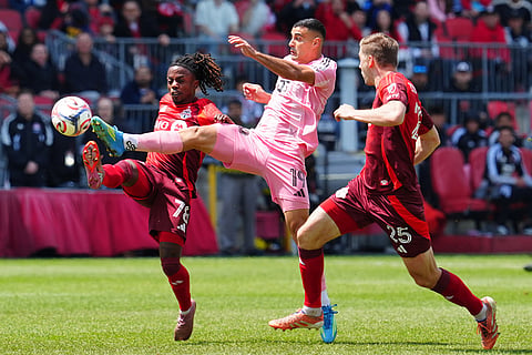 Toronto FC defender Walker Zimmerman (25) looks on as teammate Malik Henry (78) and Inter Miami CF forward German Berterame (19) reach for the ball during first half MLS soccer in Toronto.