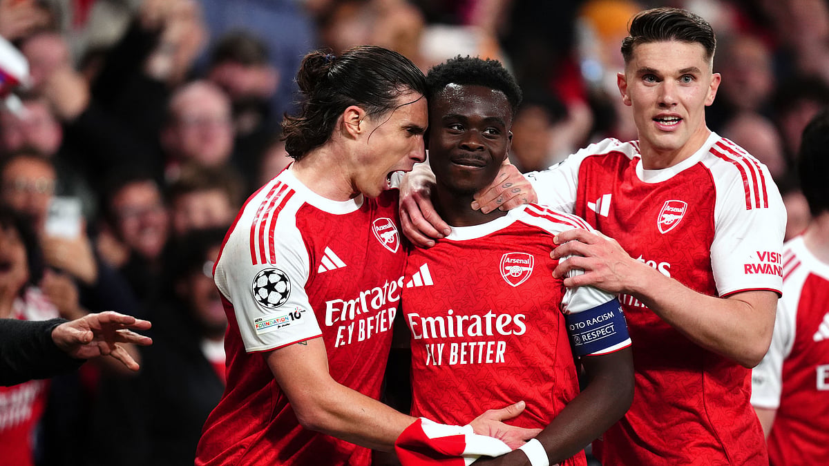 Arsenal's Bukayo Saka, center, celebrates after scoring the opening goal during a Champions League semifinal, second leg, soccer match between Arsenal and Atletico Madrid in London.  - AP Photo