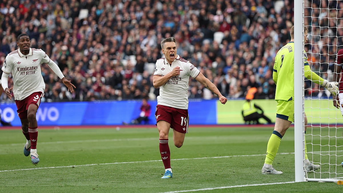 Arsenal's Leandro Trossard celebrates after scoring during the Premier League soccer match between West Ham and Arsenal in London. - AP Photo