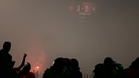 | Photo: X/ACSparta_CZ : Smoke engulfs the Fortuna Stadium after Slavia Prague fans stormed the pitch during the Czech First League match against Sparta Prague on May 9, 2026.