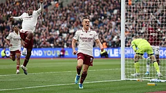 Arsenal's Leandro Trossard celebrates after scoring during the Premier League soccer match between West Ham and Arsenal in London. - AP Photo