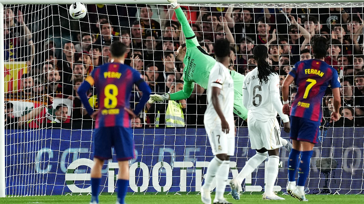 Real Madrid goalkeeper Thibaut Courtois fails to stop the opening goal from a free kick by Barcelona's Marcus Rashford during the Spanish La Liga El Clasico match between FC Barcelona and Real Madrid in Barcelona. - AP Photo