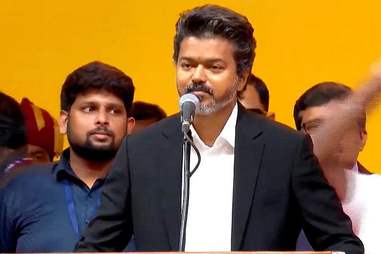 **EDS: THIRD PARTY IMAGE** In this screengrab from a video posted on May 10, 2026, Tamilaga Vettri Kazhagam (TVK) chief C Joseph Vijay takes oath as the Tamil Nadu Chief Minister during the swearing-in ceremony, at Jawaharlal Nehru Stadium, in Chennai. - | Photo: @TVKVijayHQ-Offl/YT via PTI