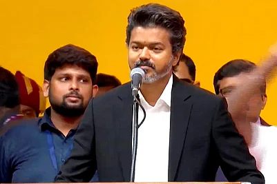 | Photo: @TVKVijayHQ-Offl/YT via PTI : **EDS: THIRD PARTY IMAGE** In this screengrab from a video posted on May 10, 2026, Tamilaga Vettri Kazhagam (TVK) chief C Joseph Vijay takes oath as the Tamil Nadu Chief Minister during the swearing-in ceremony, at Jawaharlal Nehru Stadium, in Chennai.