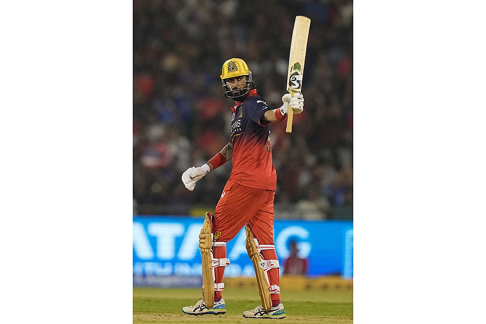 Royal Challengers Bengalurus Krunal Pandya celebrates his fifty runs