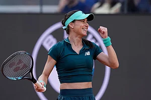 | Photo: AP/Alessandra Tarantino : Romania's Sorana Cirstea reacts after winning the match against Belarus' Aryna Sabalenka at the Italian Open tennis tournament in Rome.
