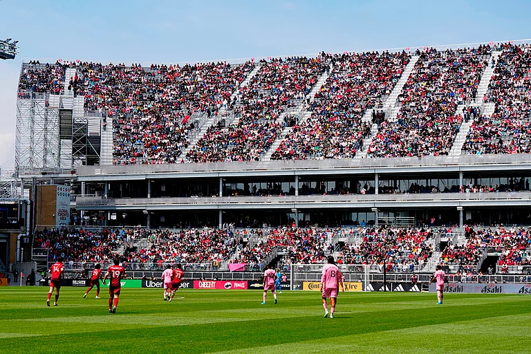 Fans watch from temporary stands at BMO Field, which were built to accommodate more fans for the 2026 World Cup, during first half MLS soccer between Toronto FC and Inter Miami CF, in Toronto. - | Photo: Frank Gunn /The Canadian Press via AP
