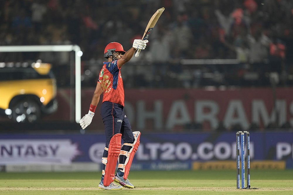 Punjab Kings captain Shreyas Iyer celebrates his fifty runs