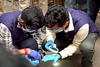 PTI : North 24 Parganas: Criminal Investigation Department (CID) officials investigate the crime scene following the killing of BJP leader Suvendu Adhikari's close aide Chandranath Rath, at Madhyamgram, in North 24 Parganas district, West Bengal, Thursday, May 7, 2026. 