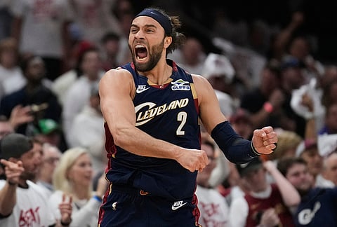 Cleveland Cavaliers guard Max Strus (2) celebrates a turnover by the Detroit Pistons in the first half of Game 3 of a second-round NBA playoffs basketball series in Cleveland. 