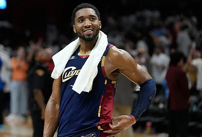 | Photo: AP/Sue Ogrocki : Cleveland Cavaliers guard Donovan Mitchell (45) smiles as fans cheer while he is interviewed after the Cavaliers defeated the Detroit Pistons in Game 3 of a second-round NBA playoffs basketball series in Cleveland.