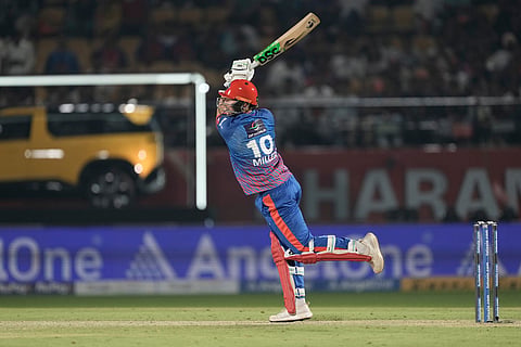 Delhi Capitals' David Miller plays a shot during the Indian Premier League cricket match between Delhi Capitals and Punjab Kings in Dharamshala, India.