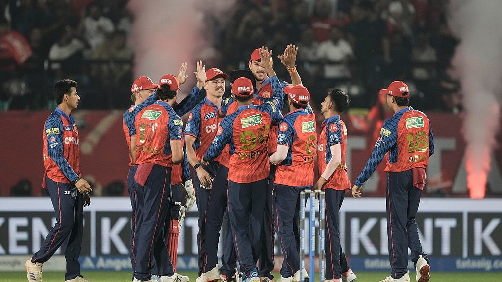 Punjab Kings players celebrate the wicket of Delhi Capitals' KL Rahul during the Indian Premier League cricket match between Delhi Capitals and Punjab Kings in Dharamshala, India, Monday, May 11, 2026. - AP Photo/Ashwini Bhatia