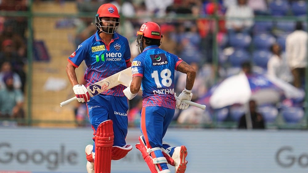 Delhi Capitals' KL Rahul, left, and Pathum Nissanka run between the wickets during their Indian Premier League match against Punjab Kings in New Delhi. - | Photo: AP/Manish Swarup