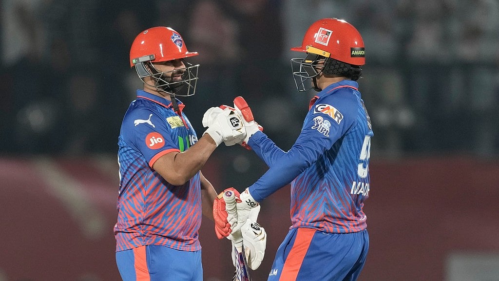 Delhi Capitals' Auqib Nabi with teammate Madhav Tiwari celebrate after wining against Punjab Kings during the Indian Premier League cricket match in Dharamshala, India, Monday, May 11, 2026. - AP Photo/Ashwini Bhatia
