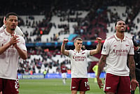 West Ham 0-1 Arsenal Premier League 2025-26: Trossard's Solitary Goal Keeps Gunners Ahead In Title Race | Photo: AP/Ian Walton : Arsenal players celebrate after the Premier League soccer match between West Ham and Arsenal in London.