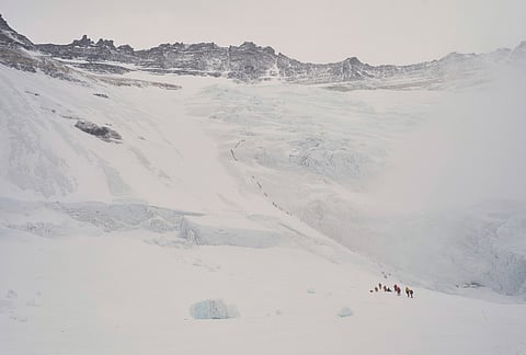 Mountaineers ascend from Lhotse Face to Camp 1 on their way to the summit of Mount Everest in Nepal.