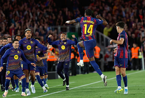 Barcelona's Marcus Rashford celebrates the opening goal during the Spanish La Liga soccer match between FC Barcelona and Real Madrid in Barcelona, Spain.