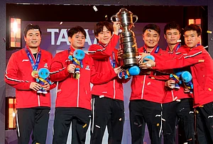 | Photo: AP/Jon Super : China celebrates winning the Men's Final and securing gold medal at the World Team Table Tennis Championships in London.