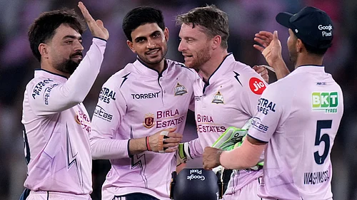 (AP Photo/Ajit Solanki) : Gujarat Titans players celebrate as they win the match against unrisers Hyderabad during the Indian Premier League cricket match, in Ahmedabad, India, Tuesday, May 12, 2026