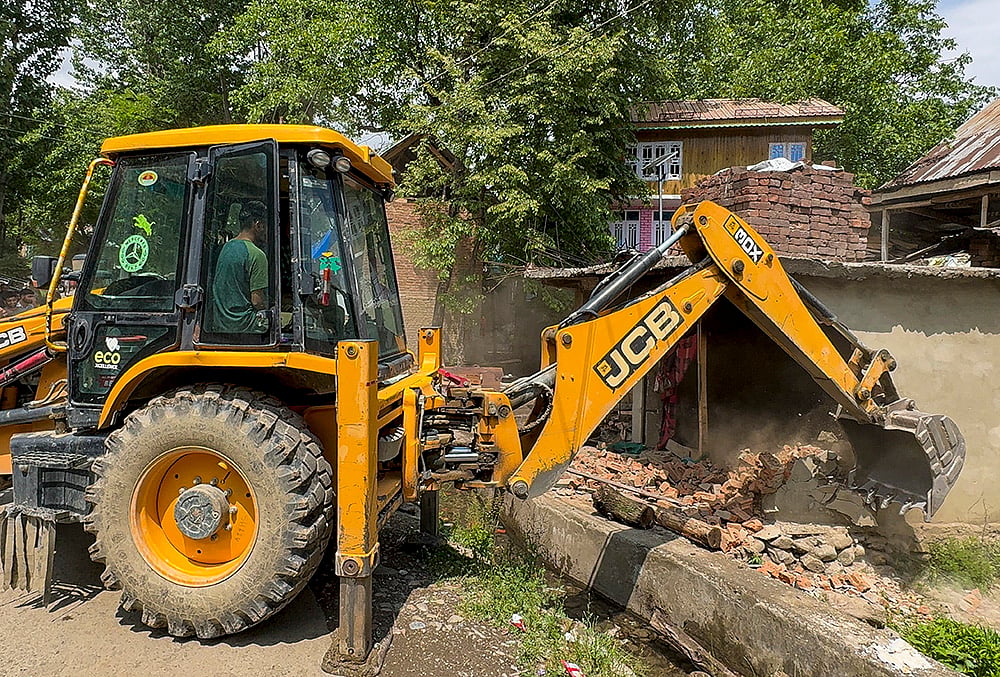 Demolition drive against drug peddler