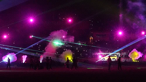 | Photo: AP/Ashwini Bhatia : A laser show lights up the sky during the Indian Premier League cricket match between Delhi Capitals and Punjab Kings in Dharamshala, India, Monday, May 11, 2026.