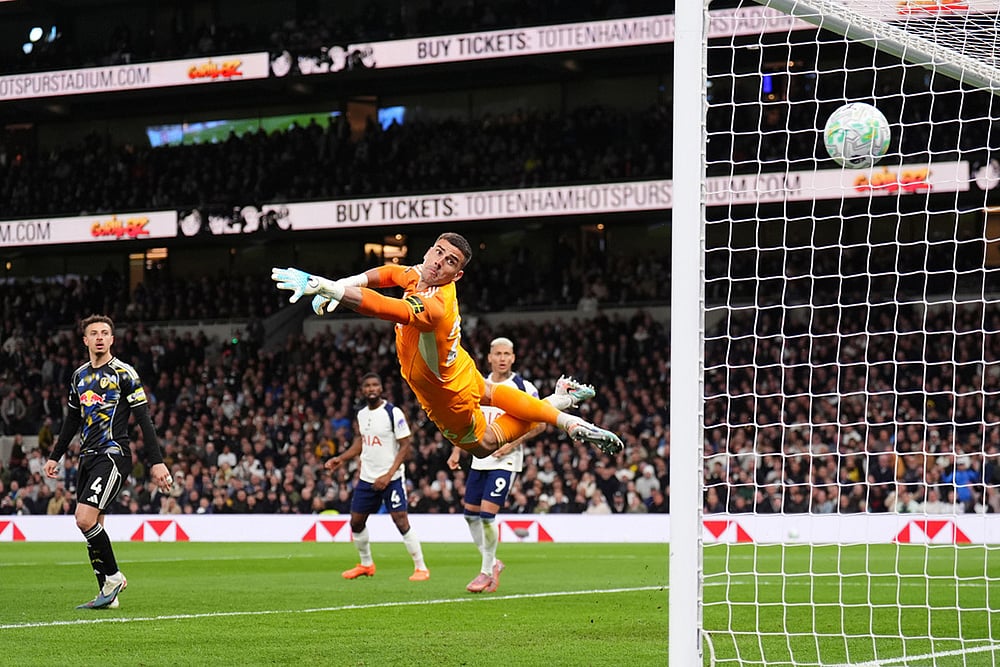 Tottenham Hotspur's Mathys Tel scores during the English Premier League soccer match between Tottenham Hotspur and Leeds United in London. - | Photo: John Walton/PA via AP