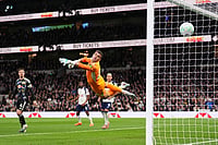 | Photo: John Walton/PA via AP : Tottenham Hotspur's Mathys Tel scores during the English Premier League soccer match between Tottenham Hotspur and Leeds United in London.