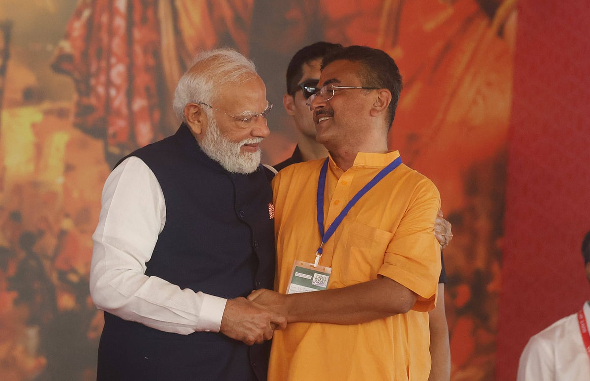 May 9, 2026, Kolkata, West Bengal, India: Prime Minister Narendra Modi gestures with Suvendu Adhikari after takes oath as the Chief Minister of West Bengal in Kolkata, India -  IMAGO / ZUMA Press Wire