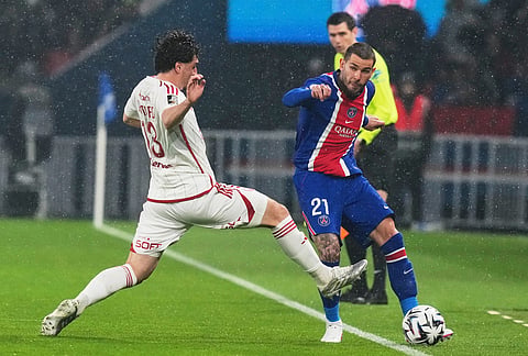 Brest's Joris Chotard, left, challenges PSG's Lucas Hernandez during the French League One soccer match between Paris Saint Germain and Brest in Paris, France.