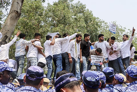 National Students’ Union of India (NSUI) members stage a demonstration against the National Testing Agency (NTA) over alleged paper leak concerns following the cancellation of the NEET-UG 2026 examination, outside Shastri Bhawan, in New Delhi.