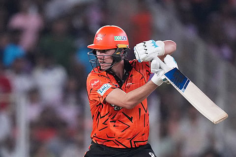 Sunrisers Hyderabad's Pat Cummins plays a shot during the Indian Premier League cricket match between Gujarat Titans and Sunrisers Hyderabad, in Ahmedabad, India.