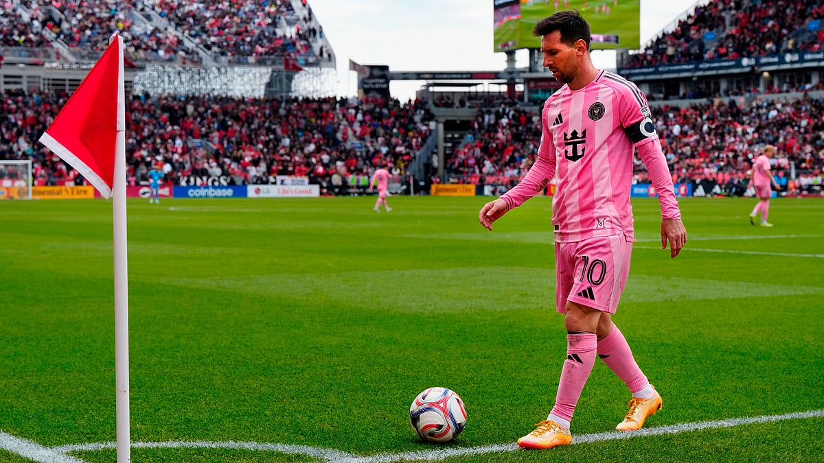 Inter Miami CF midfielder Lionel Messi (10) prepares to take a corner kick during second half MLS soccer in Toronto. - AP Photo