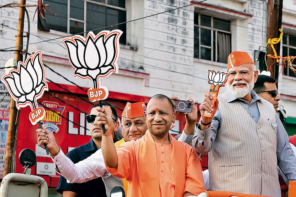 Saffron Bloom: Narendra Modi with Yogi Adityanath during a road show in Ghaziabad, Uttar Pradesh on April 6, 2024 - | Photo: Suresh K. Pandey
