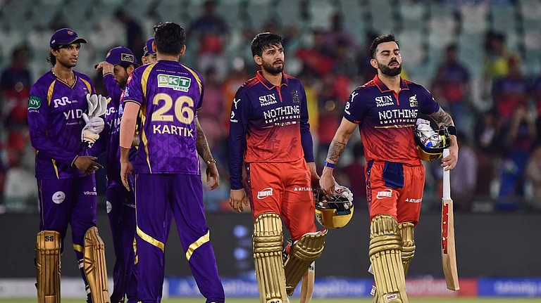 Royal Challengers Bengaluru's Virat Kohli, right, and batting partner Jitesh Sharma leave the field after winning the Indian Premier League cricket match between Kolkata Knight Riders and Royal Challengers Bengaluru in Raipur. - AP Photo