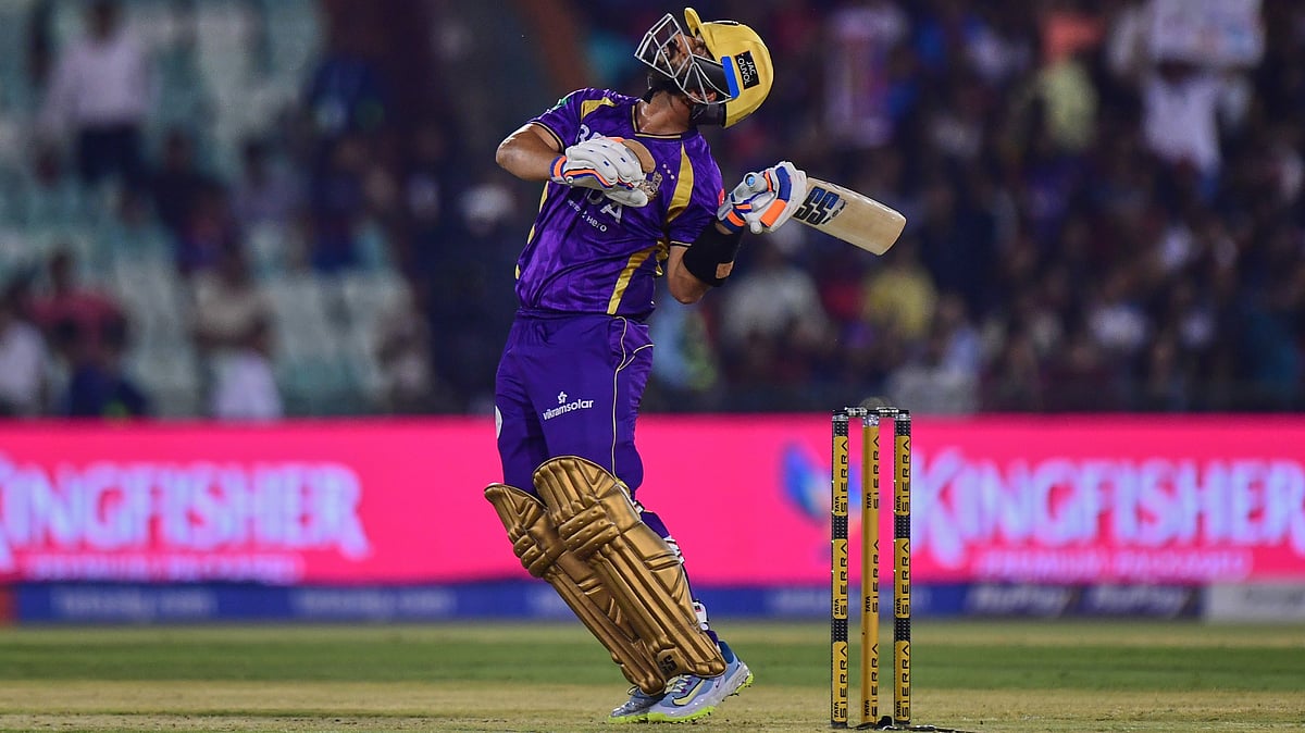 Kolkata Knight Riders' captain Ajinkya Rahane watches the ball after playing a shot during the Indian Premier League cricket match between Royal Challengers Bengaluru and Kolkata Knight Riders in Raipur, India, Wednesday, May 13, 2026 - (AP Photo/Abhijit Addya)