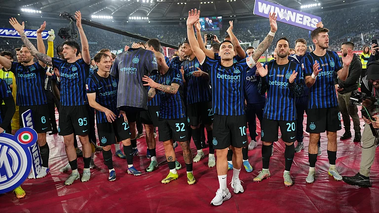 Inter Milan's Lautaro Martinez and his teammates celebrate at the end of the Coppa Italia final between Lazio and Inter Milan, in Rome. - AP Photo