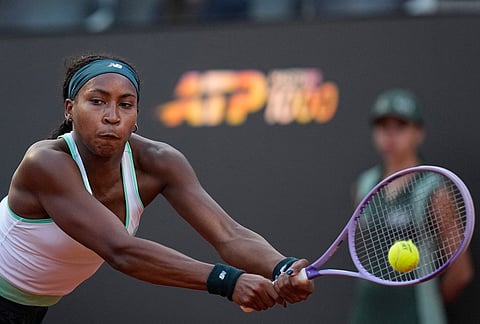 Coco Gauff of the United States returns to Mirra Andreeva of Russia during their match at the Italian Open tennis tournament in Rome.