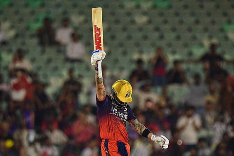 Royal Challengers Bengaluru's Virat Kohli celebrates his fifty runs during the Indian Premier League cricket match between Royal Challengers Bengaluru and Kolkata Knight Riders in Raipur, India.