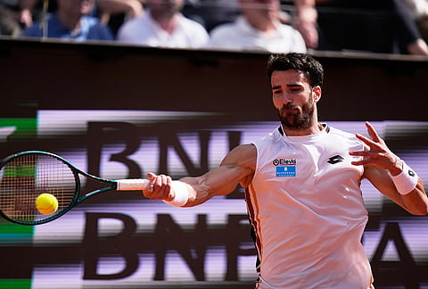 Italy's Andrea Pellegrino returns the ball to Italy's Jannik Sinner, during their match at the Italian Open tennis tournament in Rome.