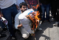 | Photo: AP/Channi Anand : Congress party supporters burn an effigy of Union Education Minister Dharmendra Pradhan during a protest against the central government following the cancellation of the NEET-UG 2026 examination amid allegations of a paper leak and irregularities, in Jammu.