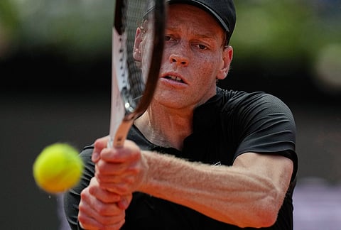 Italy's Jannik Sinner returns the ball to Italy's Andrea Pellegrino, during their match at the Italian Open tennis tournament in Rome.