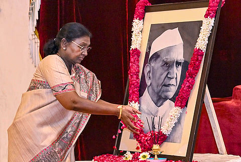 President Droupadi Murmu pays tribute to former president Fakhruddin Ali Ahmed on the latter’s birth anniversary, in New Delhi. 