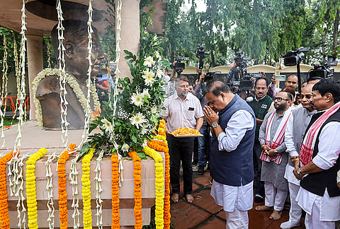 Assam Chief Minister Himanta Biswa Sharma pays tribute to the first Chief Minister of the state, Gopinath Bordoloi, in Guwahati.